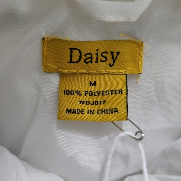 Daisy Crop Zip Up Puffer Vest. Size Medium. New. Open sides that tie. - Picture 6 of 7